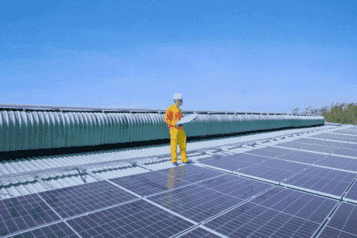 A Solar Technician Installing Rooftop Solar Panels