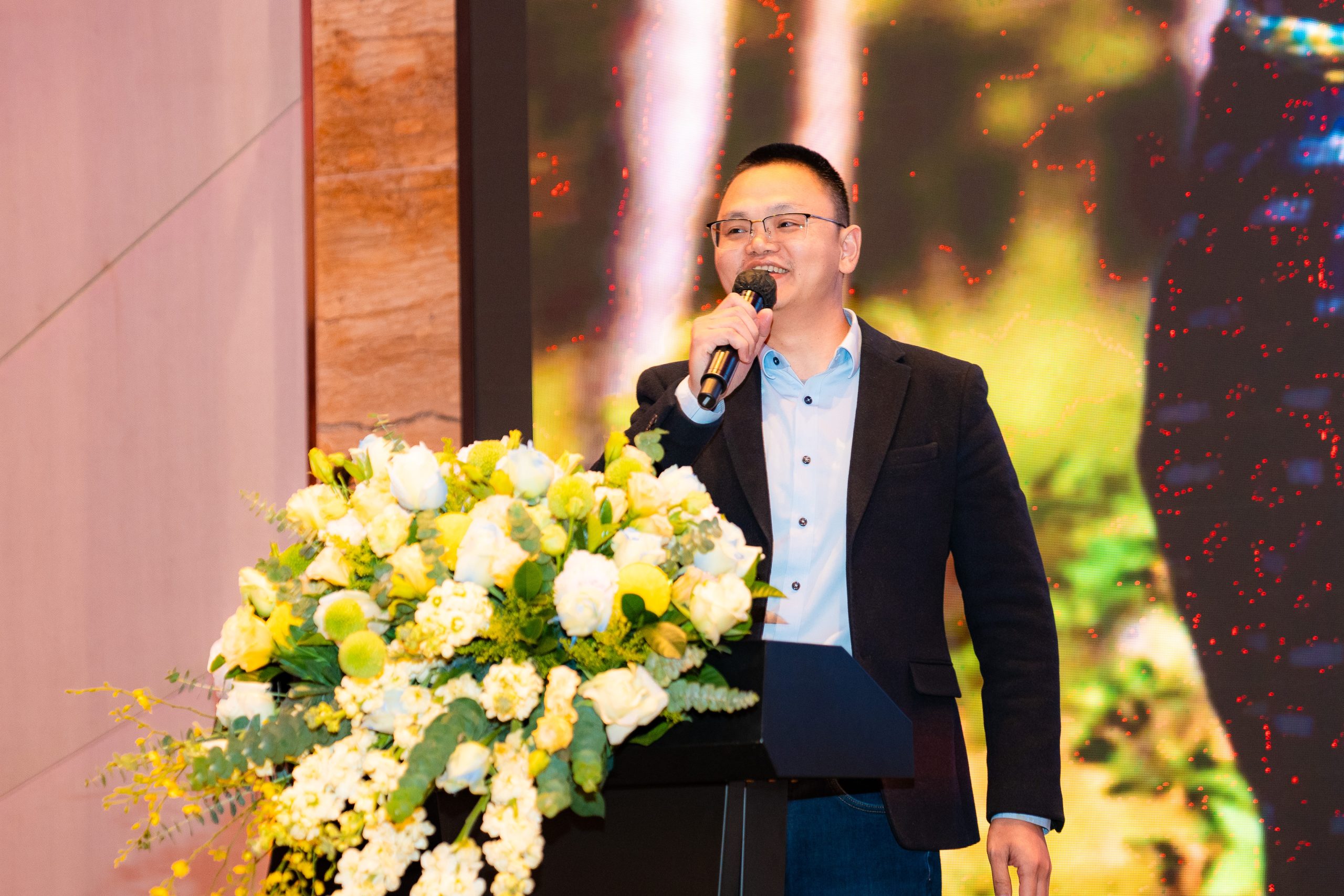 WHC Solar representative introducing renewable energy solutions at a partner exchange event